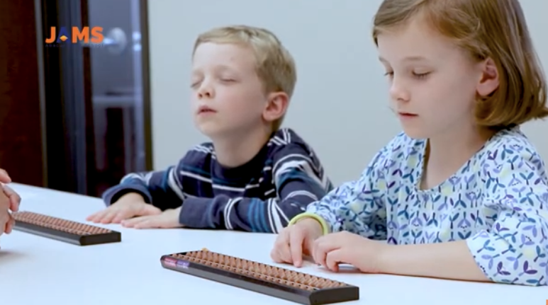 JAMS students practicing abacus